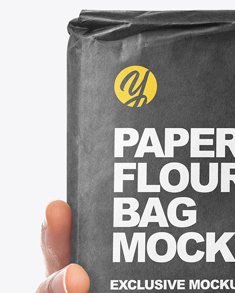 Download Paper Flour Bag in Hand Mockup in Bag & Sack Mockups on Yellow Images Object Mockups