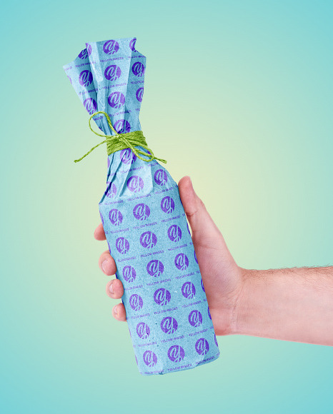 Bottle In Craft Paper Mockup PSD #7