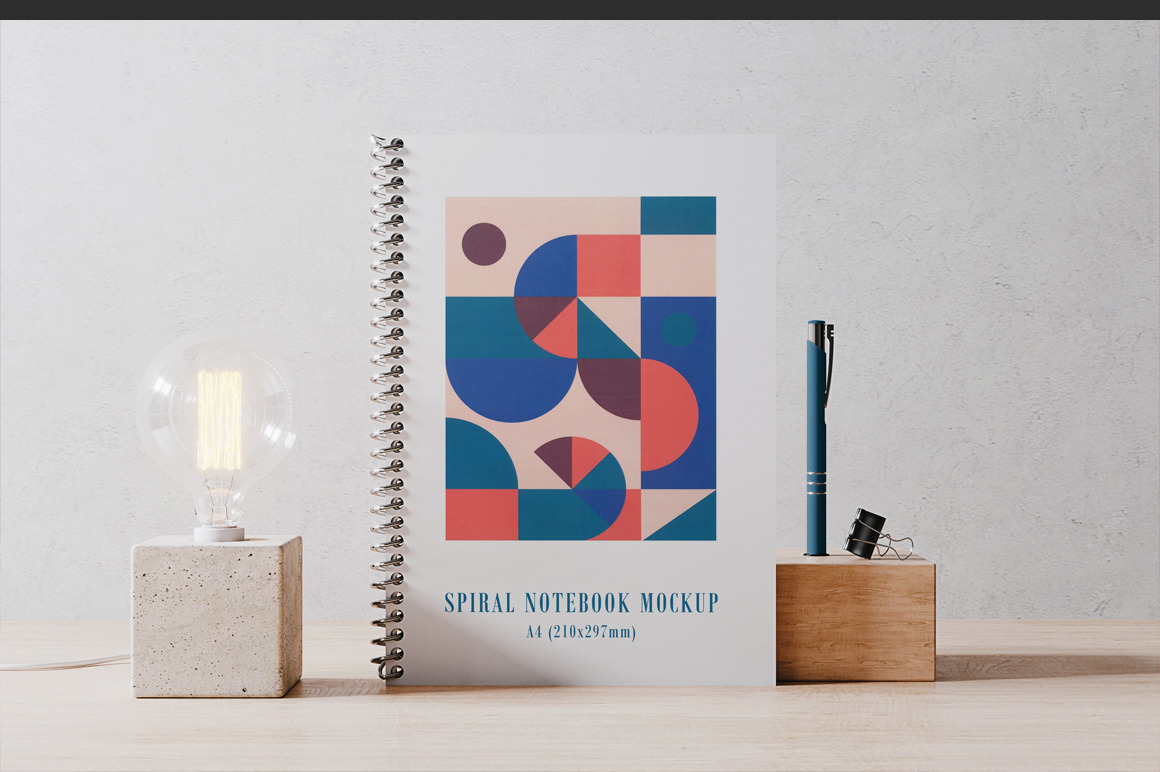 А4 Spiral Coil Binding Book Mockup on Yellow Images Creative Store