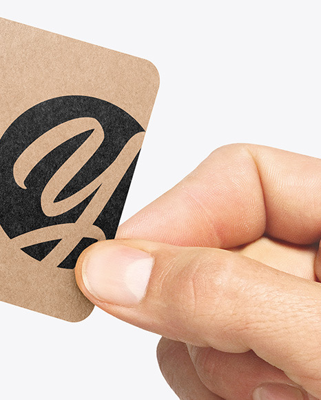 Kraft Business Card in a Hand Mockup Kraft Business Card in a Hand Mockup