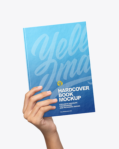 Hardcover Book in a Hand Mockup PSD #4