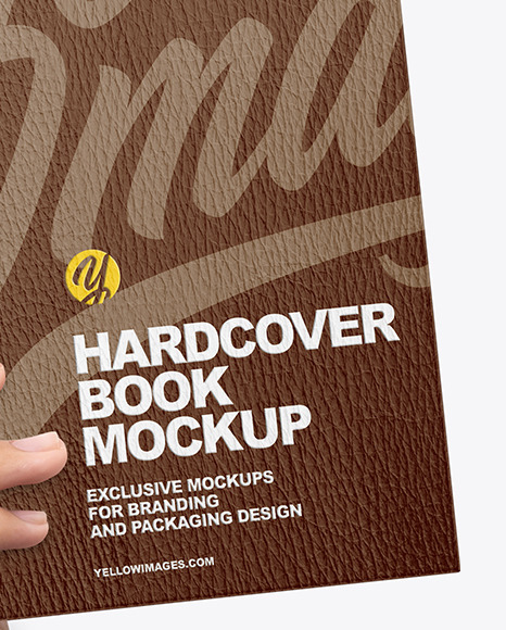 Leather Hardcover Book in a Hand Mockup Leather Hardcover Book in a Hand Mockup