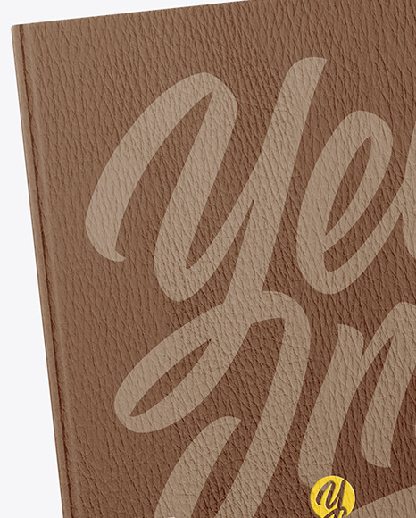Leather Hardcover Book in a Hand Mockup Leather Hardcover Book in a Hand Mockup