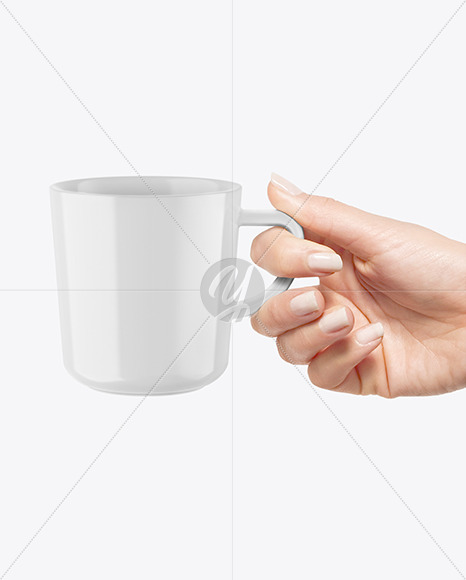 Glossy Mug in a Hand Mockup PSD #3