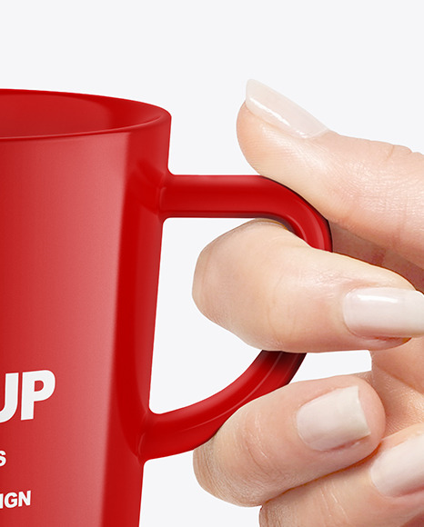 Glossy Mug in a Hand Mockup PSD #1