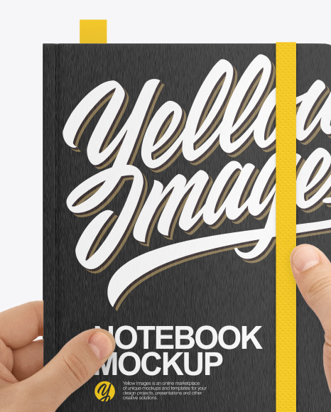 Notebook in a Hand Mockup PSD #2