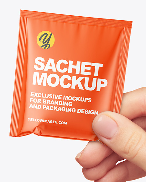 Glossy Sachet in a Hand Mockup PSD #2