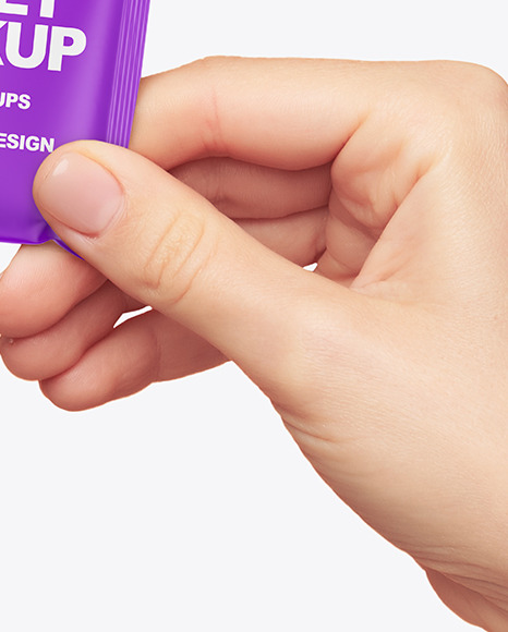 Matte Sachet in a Hand Mockup PSD #1