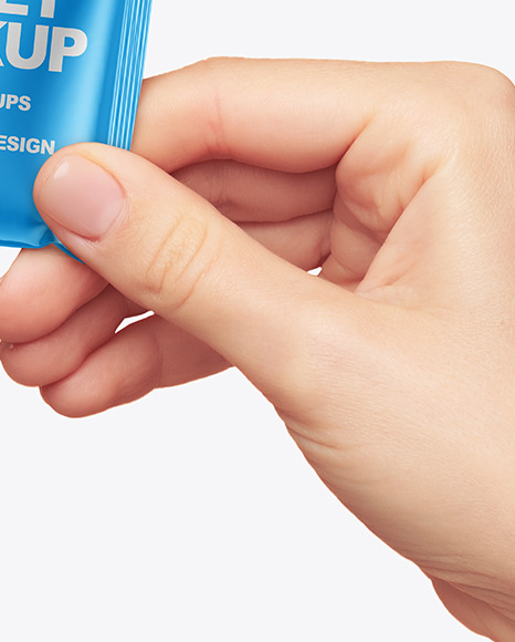 Metallic Sachet in a Hand Mockup PSD #1