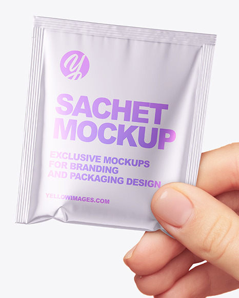 Metallic Sachet in a Hand Mockup PSD #7