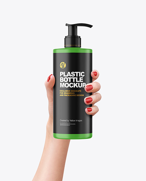 Matte Cosmetic Bottle with Pump in a Hand Mockup