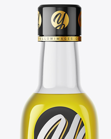 Clear Glass Bottle with Olive Oil Mockup PSD #1