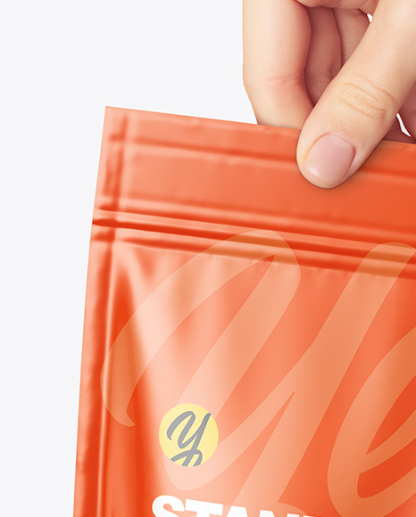 Glossy Stand up Pouch in a Hand Mockup PSD #1