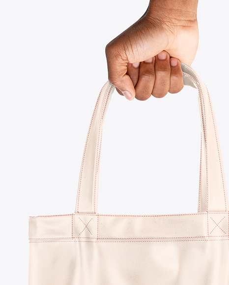 Cotton Bag in a Hand Mockup PSD #1