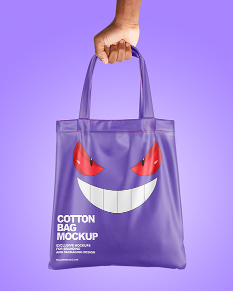 Cotton Bag in a Hand Mockup PSD #6
