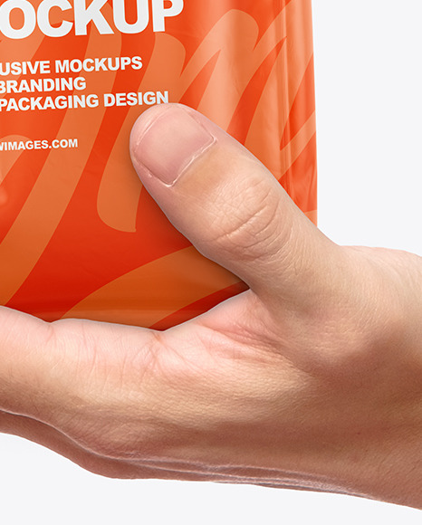 Glossy Food Bag in a Hand Mockup PSD #1