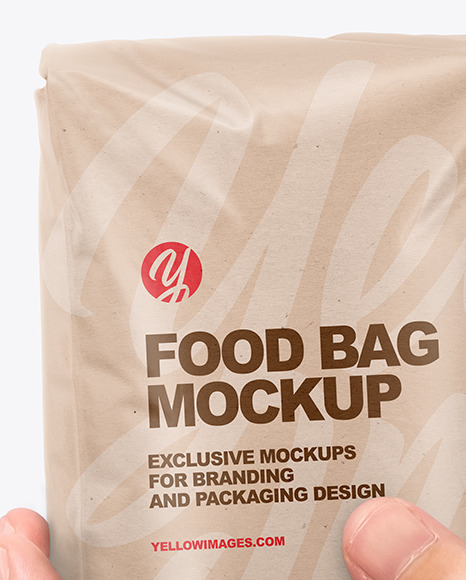 Kraft Food Bag in a Hand Mockup PSD #2