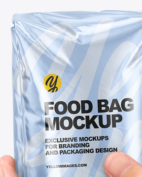 Metallic Food Bag in a Hand Mockup PSD #2