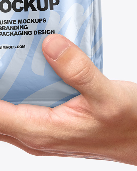 Metallic Food Bag in a Hand Mockup PSD #1