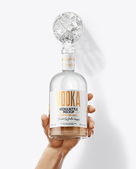 Vodka Bottle in the Hand Mockup