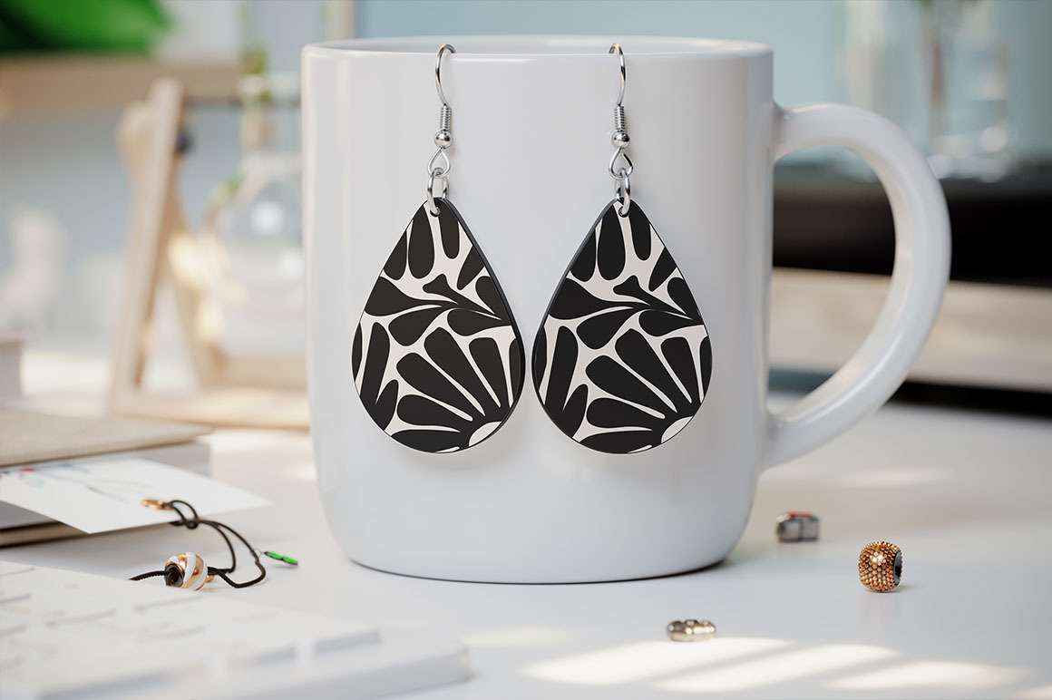 Teardrop Sublimation Earrings Mockup on Yellow Images Creative Store