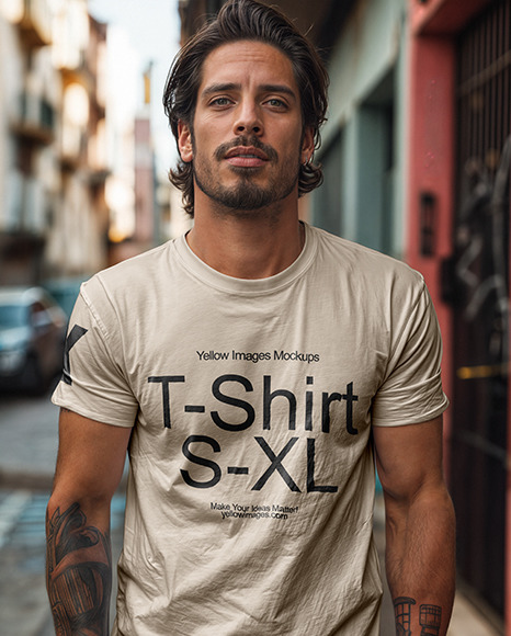 A Man with Tattoos Wearing a T-Shirt Mockup