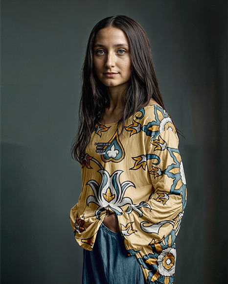 A Woman Wearing a Long Sleeve T-Shirt and Pants Mockup