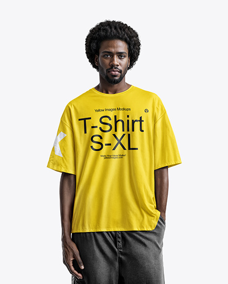 Man Wearing an Oversize T-Shirt and Jeans Mockup