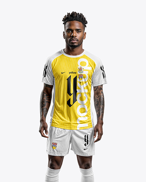 A Man Wearing a Raglan Soccer Jersey and Shorts Mockup