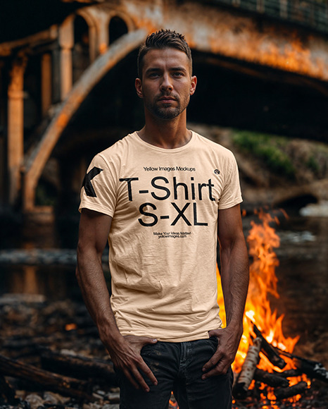 A Man Wearing a T-Shirt Stands Under The Bridge Mockup