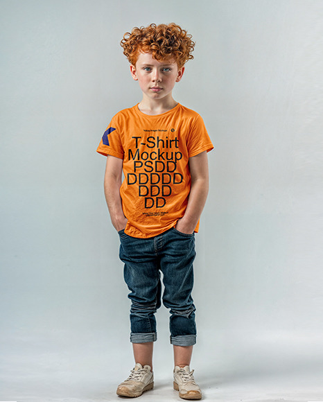 A Young Boy with Red Curly Hair Wearing a T-Shirt and Jeans Mockup