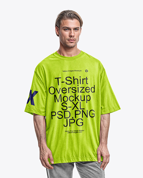 Man Wearing an Oversize T-Shirt and Pants Mockup