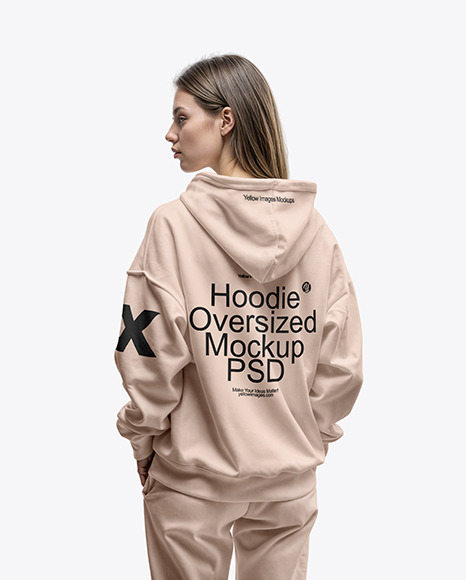 Young Woman Wearing an Oversize Hoodie and Sweatpants Mockup