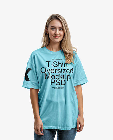 Woman with Blonde Hair Wearing an Oversize T-Shirt and Jeans Mockup