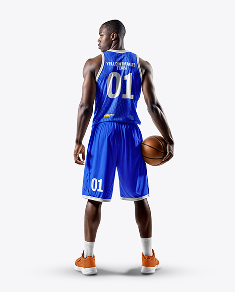 Black Man Wearing a Full Basketball Kit with Ball Mockup - Back View