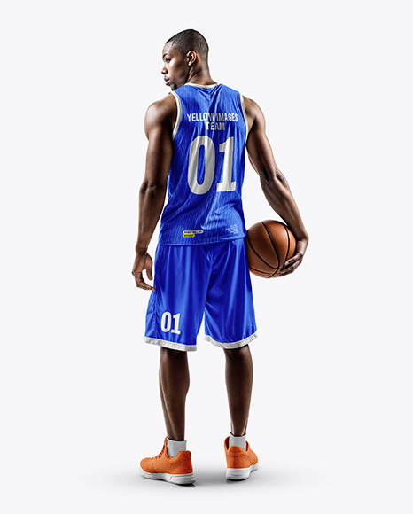A Man Wearing a Full Basketball Kit with Ball Mockup - Back View