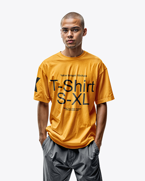 Man Wearing an Oversize T-shirt and Pants Mockup