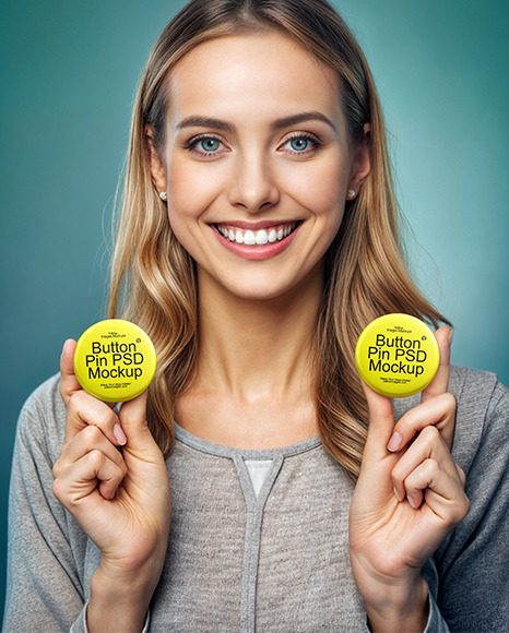 Smiling Woman Holds Two Pin-Back Buttons Mockup