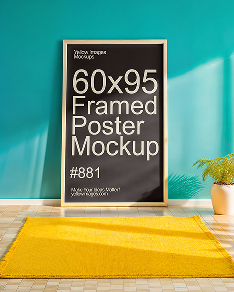 Framed Poster Next to Blue Wall Mockup