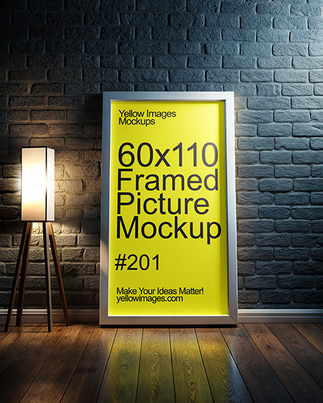 Framed Picture Next to Black Wall with Lamp Mockup