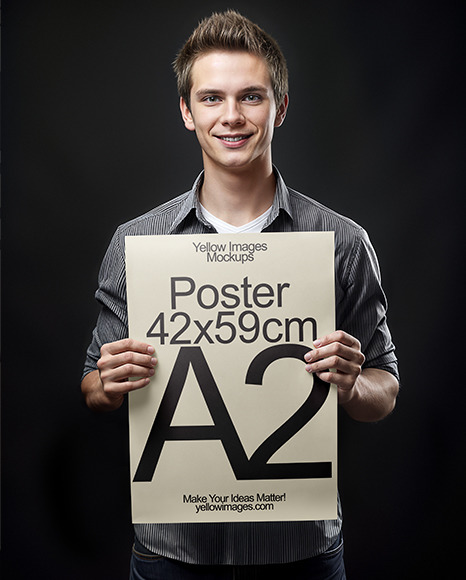 Young Man Holding a Paper Poster Mockup