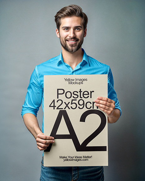 Smiling Man in a Shirt Holding Paper Poster Mockup