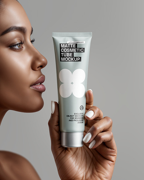 Black Woman Holding Cosmetic Tube in a Hand Mockup