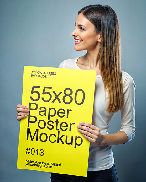 Smiling Woman in a Shirt Holding Paper Poster Mockup