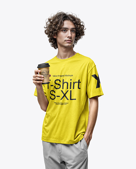 Curly Man Wearing a T-Shirt and Pants Holds a Coffee Cup in a Hand Mockup