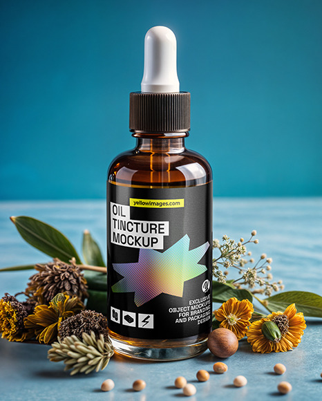Amber Dropper Bottle with Oil Tincture Surrounded by Dried Flowers Mockup