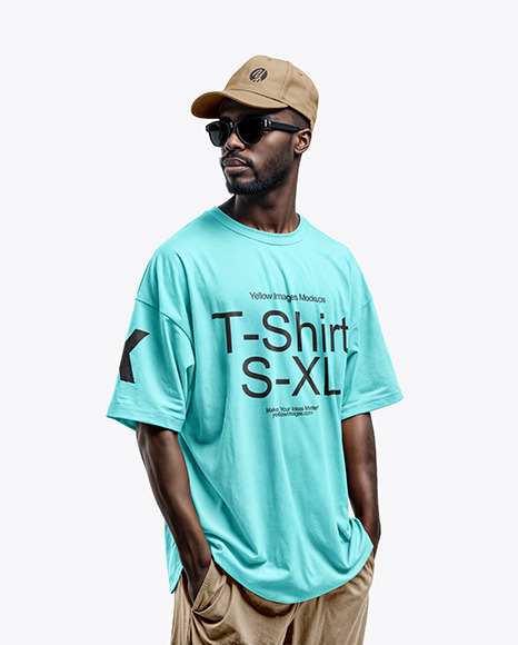 A Black Man Wearing an Oversize T-Shirt and Baseball Cap Mockup