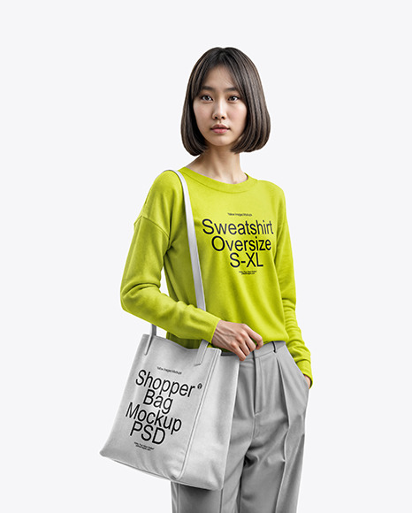 An Asian Woman with Tote Bag Wearing a Sweatshirt and Pants Mockup
