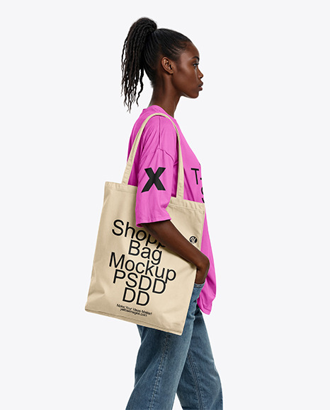 Young Woman with Tote Bag Wearing a T-Shirt and Jeans Mockup