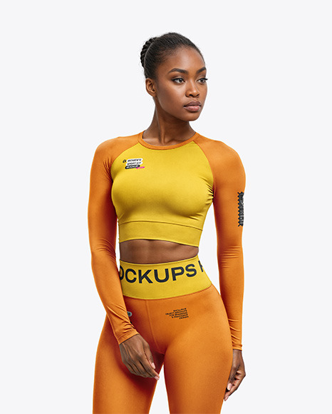 Woman Wearing a Long Sleeve Crop Top and Leggings Mockup